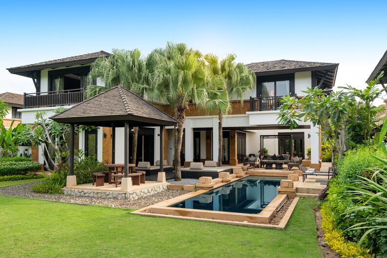 Luxury villa with modern architecture and a private pool in Bangalore. Expert villa construction services